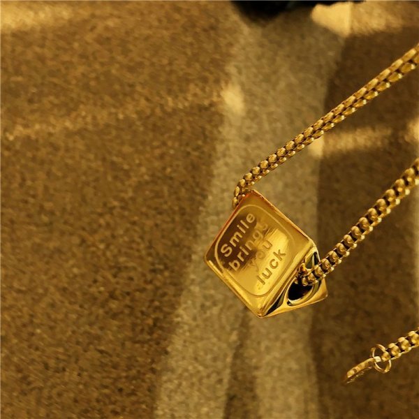 Retro style temperament letters smiley face triangle pendant lockbone chain titanium steel color preservation short necklace high quality tide products